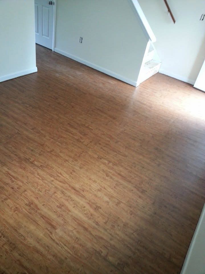 Finished wood-look plank flooring in a kitchen