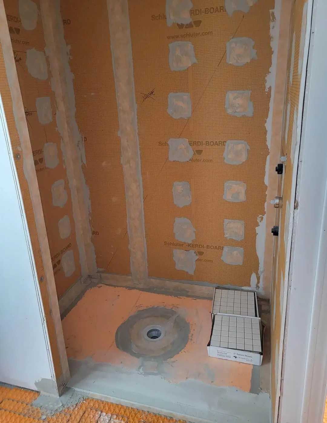Shower stall framed and waterproofed with Schluter Kerdi-Board, ready for tile